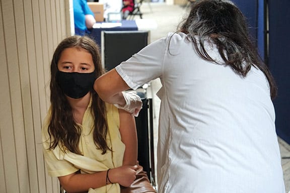Seventh-grader gets vaccinated